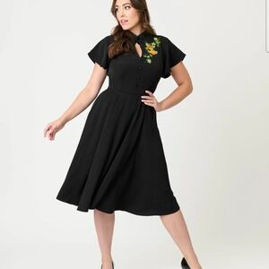 Unique Vintage Black Midi Dress with Floral Accents